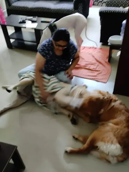 Ramya giving a gentle towel dry to one of our guests after they got a little wet. We take care of all the little things to keep them comfortable.