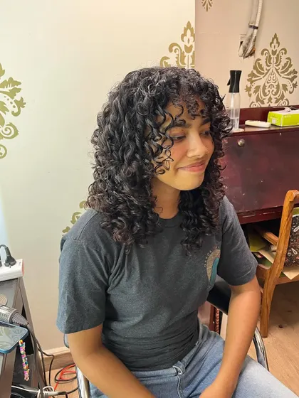Brittney enjoying her new, easy-to-manage curly style.