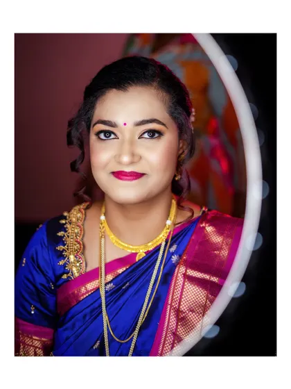 A stunning portrait of the bride-to-be, using a ring light to create a beautiful bokeh effect.