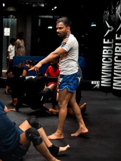 I guide students through ground drills, correcting posture and technique to ensure they understand the mechanics of Jiu-Jitsu.