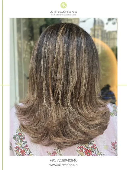 We created this soft, dimensional look with mushroom blonde highlights, a blend of neutral tones for a modern and chic style.