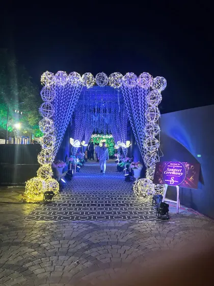 The same Sangeet passage lit in a different color, showing the versatility of the design.