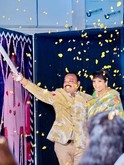 A moment of pure joy. I combined a confetti blast with sparklers for this special reveal, showering the couple in golden petals and light as they made their entrance.