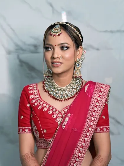 A look of pure radiance. The subtle shimmer on the eyes and the flawless skin work together to create a timeless and elegant bridal look.
