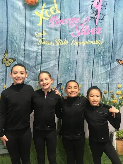 The Bronze team celebrating together after a strong finish to their competition season.