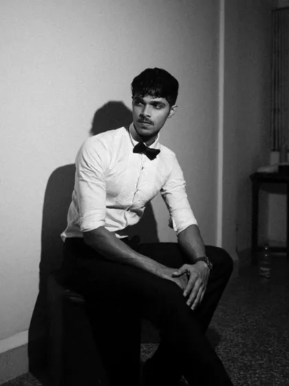 More from the black and white tuxedo series, exploring different poses and lighting angles. I used smoke and shadows to add texture and mood.
