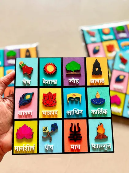 The vibrant colors and cultural symbols of the Marathi calendar make it a conversation starter in any room.
