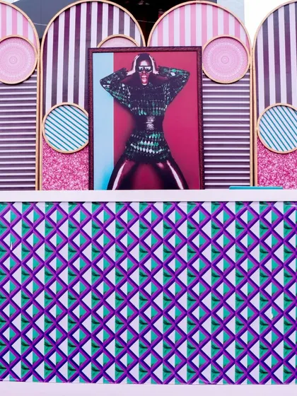 The bar front from the 'Art in the City' event, showcasing a vibrant mix of geometric patterns, stripes, and bold pop art.