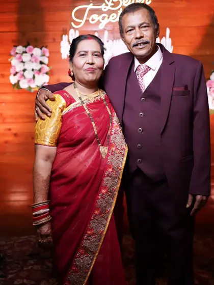 A touching portrait of the bride's parents, looking elegant and happy.