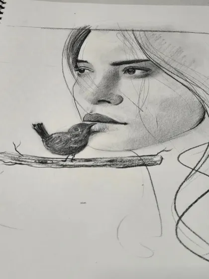 A beautiful pencil sketch in a student's sketchbook, demonstrating the foundational skills of portraiture and shading that we teach in our drawing classes.