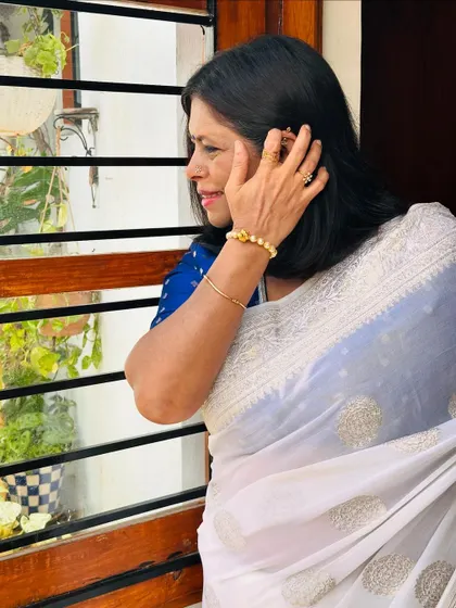 Here I am, glowing with grace on Day 5 of Navratri in a stunning white saree that reflects purity and serenity. A moment of timeless elegance.