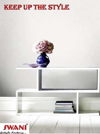 This minimalist white console table is all about clean lines and modern simplicity. Its asymmetric design provides both a display surface and a storage nook for books, making it a stylish and practical piece for any contemporary space.