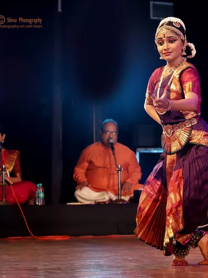 Performing alongside the talented musicians who bring each piece to life. Their live music is the heartbeat of the performance.