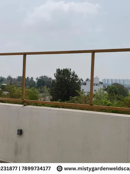 A simple but strong metal railing frame being installed. This is the foundation for a secure and durable safety barrier.