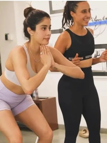In the heart of Bollywood, we are privileged to train the industry's finest. Here I am guiding Janhvi Kapoor through a squat, focusing on form and control to maintain her incredible energy and physique.