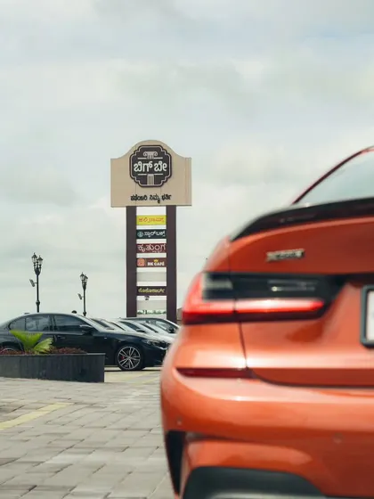 A glimpse of our parking area with the Big Bay sign in the background. We are the one-stop destination for everything you need on your highway journey.