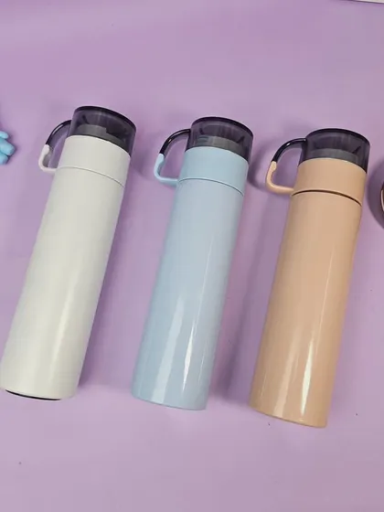 This quirky 'Tall Flask 2.0' is a versatile travel companion. It keeps drinks hot or cold for hours, has a handy drinking cup as a lid, and can be engraved with a name or logo.