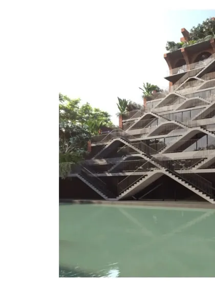 A render showing the grand scale of the Sanskriti Vihara facade, with its network of stairs and landings overlooking a large pool. It is an ancient modern idea, a return to our glorious past.
