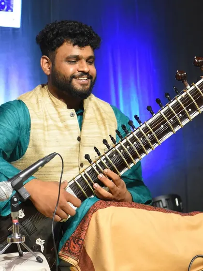 The joy of a performance is evident in this picture. Connecting with the audience through music is the ultimate reward for any artist.