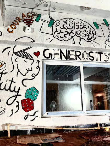 A section of the CA hostel mural featuring words like "Generosity" and "Integrity," designed to inspire the students living there.