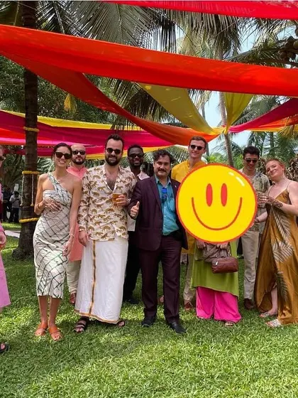 Posing with a group of international and local guests at a wedding in Goa. Magic is a universal language that brings people together, no matter where they are from.