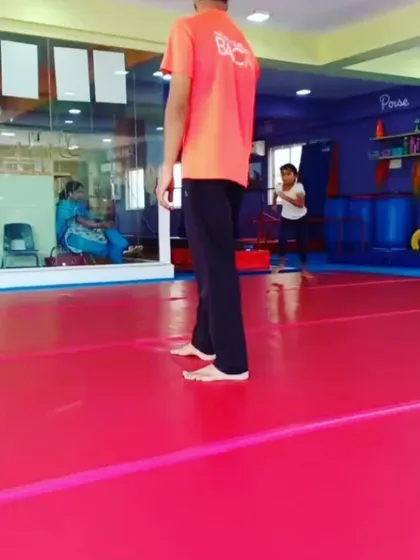 Our advanced grade schoolers practicing their skills. These action shots capture the dynamic movements and focus required for higher-level gymnastics.