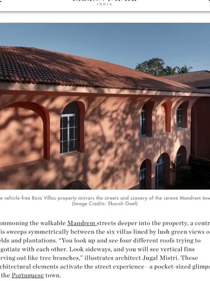 This feature in Design Pataki highlights how the vehicle-free property mirrors the walkable streets of Mandrem. The design summons the town's character into the property, with a central axis, curving vertical fins, and four intersecting roofs creating a pocket-sized glimpse of a Portuguese town.