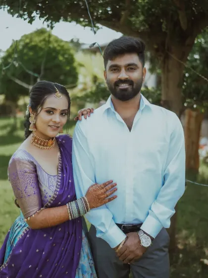 Our client and her partner, showcasing her complete traditional look. This half saree is a popular rental choice for engagement ceremonies.