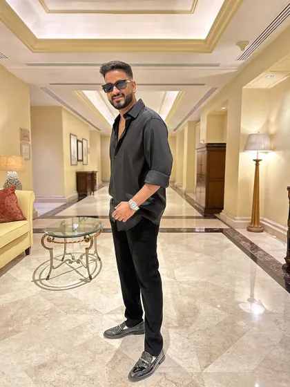 A stylish shot in a hotel corridor before a private gig.