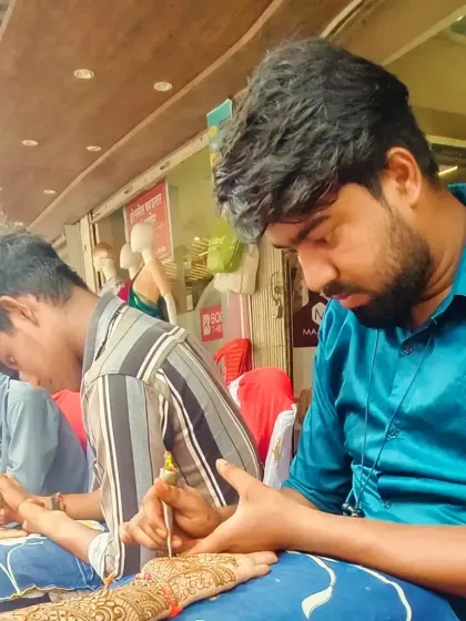 My team of professional artists working efficiently during a busy event. Having multiple artists means we can serve many guests at once, keeping the party moving.