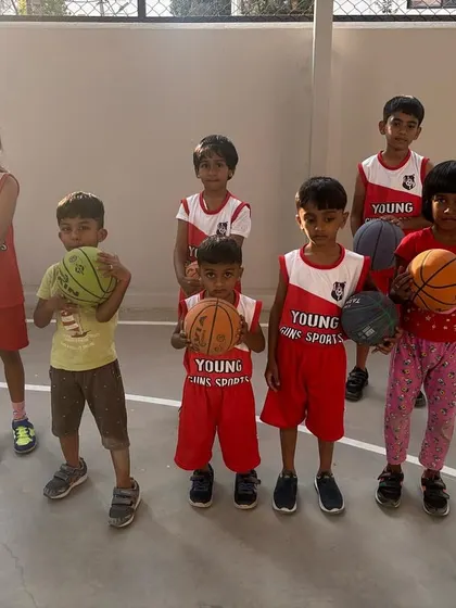 Ready to be a basketball star? Our young hoops team proudly shows off their basketballs after a great session. We focus on teaching the fundamentals of the game in a way that’s fun and builds teamwork from day one.