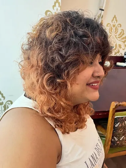 A side view of the curly shag with color.