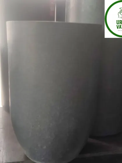 A simple and elegant dark grey fiber pot.