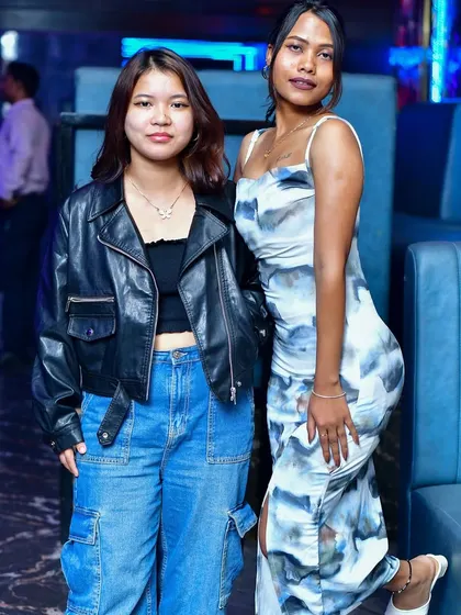 Posing for a photo before hitting the dance floor. A snapshot of the diverse and fashionable crowd that comes to my gigs.