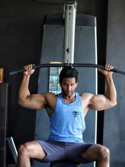 Working on my back. I believe a strong back is the foundation of a strong body.