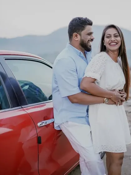 A fun and casual shot from a road trip-themed pre-wedding session, showing the couple's adventurous side.