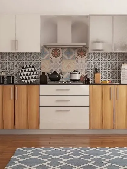This straight-line kitchen design combines natural wood grain with white cabinets and a vibrant patterned tile backsplash. It's a perfect example of how we blend modern and traditional elements for a unique look.