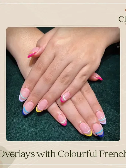 Nailed it. These gorgeous overlays with colorful French tips are the perfect way to get you through the week with a pop of color and style.