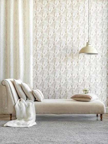 Here, I matched a heavy, floor-length cream curtain with the room's sophisticated decor. The thick fabric provides excellent light blocking and adds a touch of luxury, perfectly complementing the elegant chaise lounge and patterned wallpaper. This is a great example of how I help you select drapery that completes your room's aesthetic.