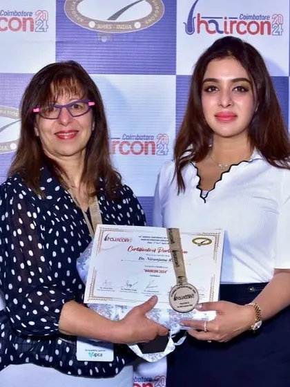 Receiving a certificate of appreciation for my contribution as a faculty member at Haircon 2024. It is always rewarding to be recognized by my peers.