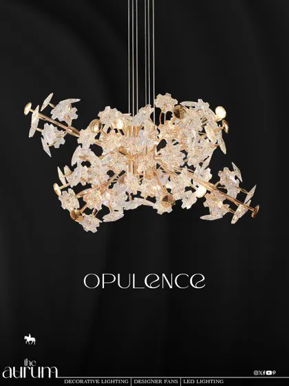 Named 'Opulence', this fixture is a celebration of intricate, nature-inspired design. The clustered, textured glass elements create a sparkling canopy of light, ideal for making a dramatic statement in a high-ceilinged living room.
