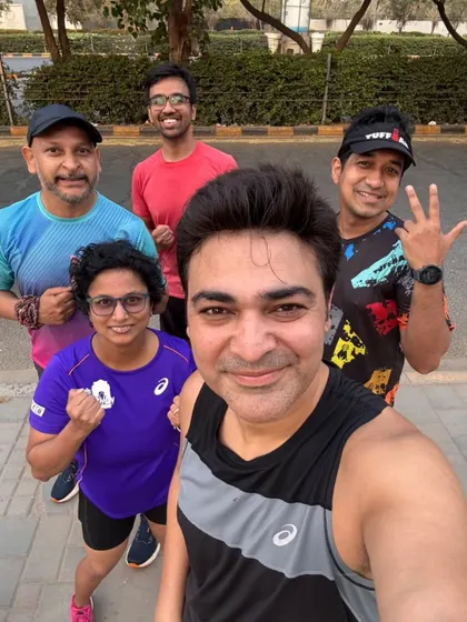 A selfie of the group, showing the bonds forged through shared miles and effort.