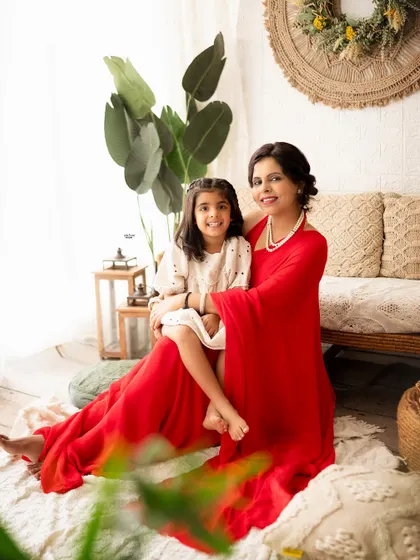 A sweet mother-daughter portrait. They both look so beautiful and happy in our cozy boho studio setup.