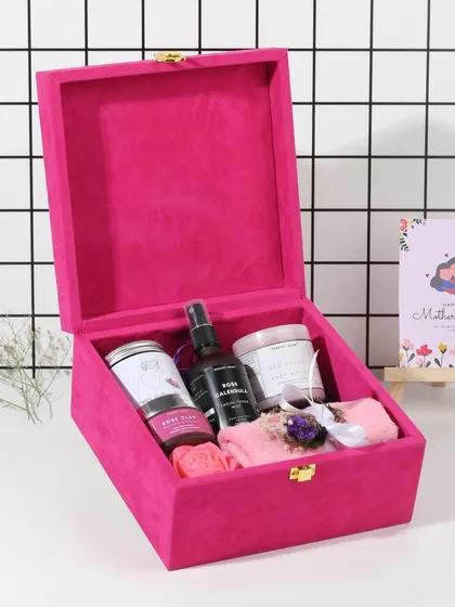 Another view of the luxurious pink velvet Mother's Day hamper, filled with items like Rose Velvet Body Butter, a Rose Clay Facial Mask, and a Rose Calendula Facial Mist.