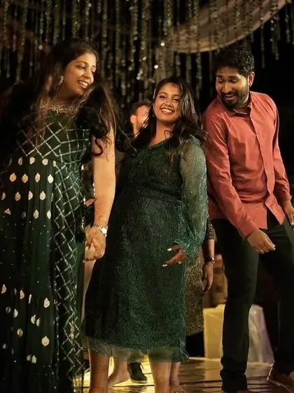 The bride celebrating with her family on the dance floor. These candid moments are just as important as the choreographed ones.