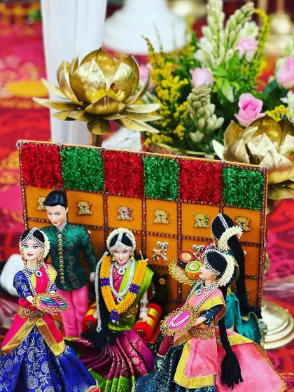 A charming detail from the Seemantham decor, featuring traditionally dressed dolls. These small, thoughtful touches make the celebration even more special.