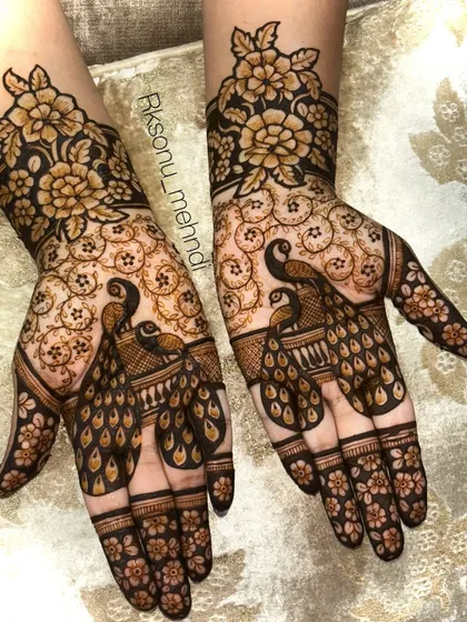 This gallery showcases a variety of my traditional designs. You'll find classic elements like peacocks, elephants, lotuses, and intricate jaali (net) patterns, all expertly crafted to create timeless beauty.