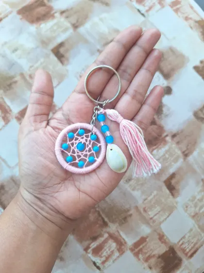 A playful combination of pink and blue in our shell dreamcatcher keychain. These are perfect for corporate gifting or as part of a curated gift hamper.