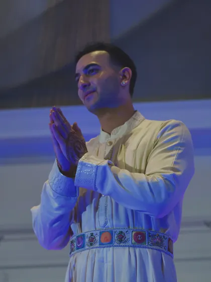 A moment of gratitude with hands in 'namaste'.