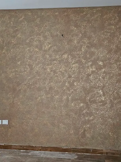 This wall showcases our Calcecruda Baroque Lace and Mandala design, which received a 5-star review. The rich brown and gold tones create a luxurious, antique effect with incredible depth and detail.